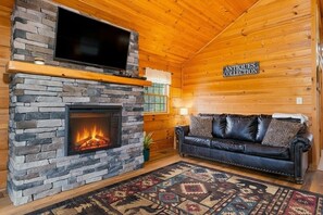 TV, fireplace, DVD player - GUESTS RAVE: Super Clean. LURAY Log Cabin Mountain Views Hot Tub Stone Fireplace (Stanley)
