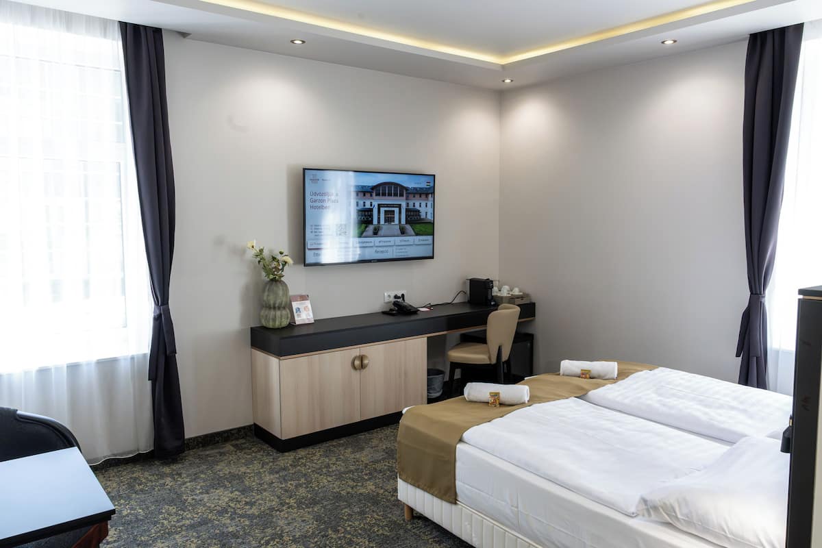 Chambre Supérieure, 2 lits une place