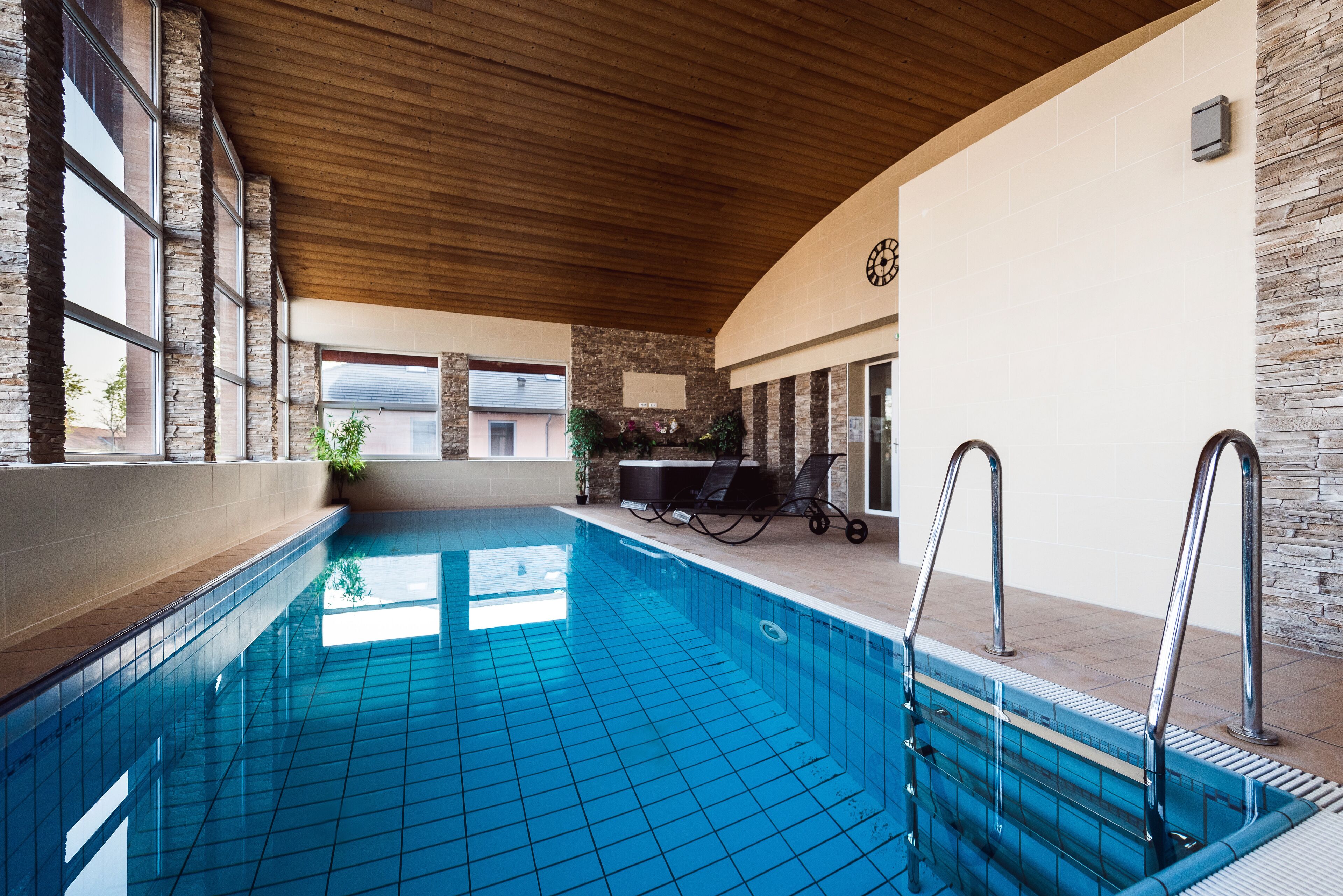 indoor pool, open 9:00 am to 9:00 pm, pool loungers