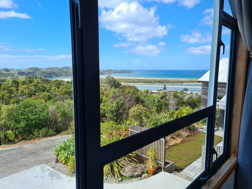 Cedar Heights Chalet with Elevated Ocean Views in a Native bush setting.