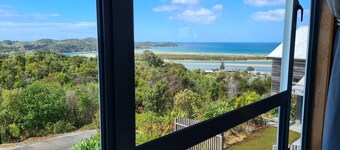 Cedar Heights Chalet with Elevated Ocean Views in a Native bush setting.