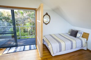 1 bedroom, desk, iron/ironing board, travel crib