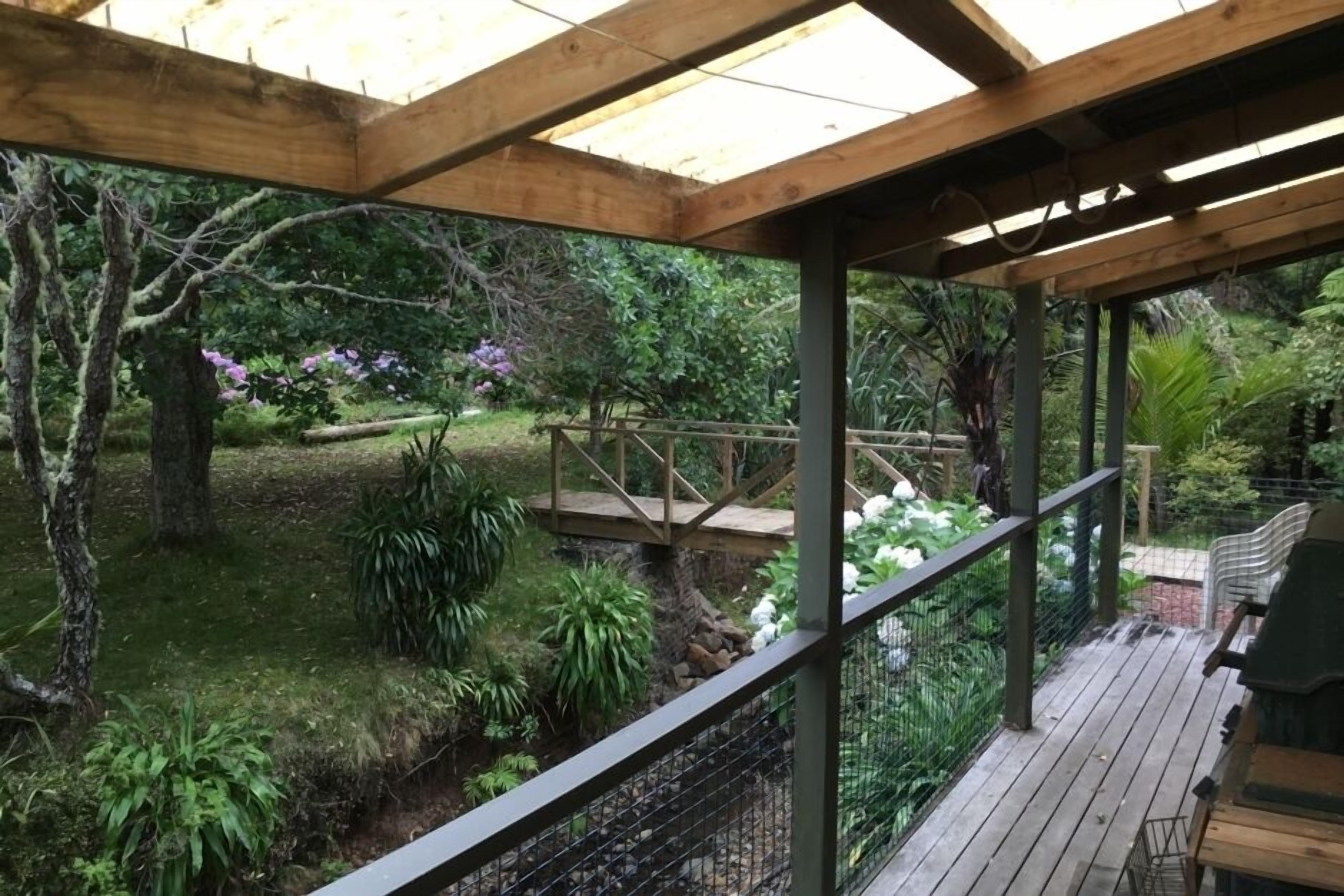 Cottage deck overlooking stream
