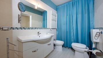 Hair dryer, towels, soap, toilet paper