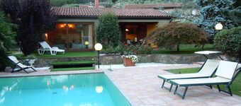 House with large veranda, garden and swimming pool