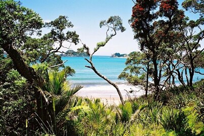 Comfortable bach with stunning views over a beautiful beach