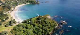 Comfortable bach with stunning views over a beautiful beach