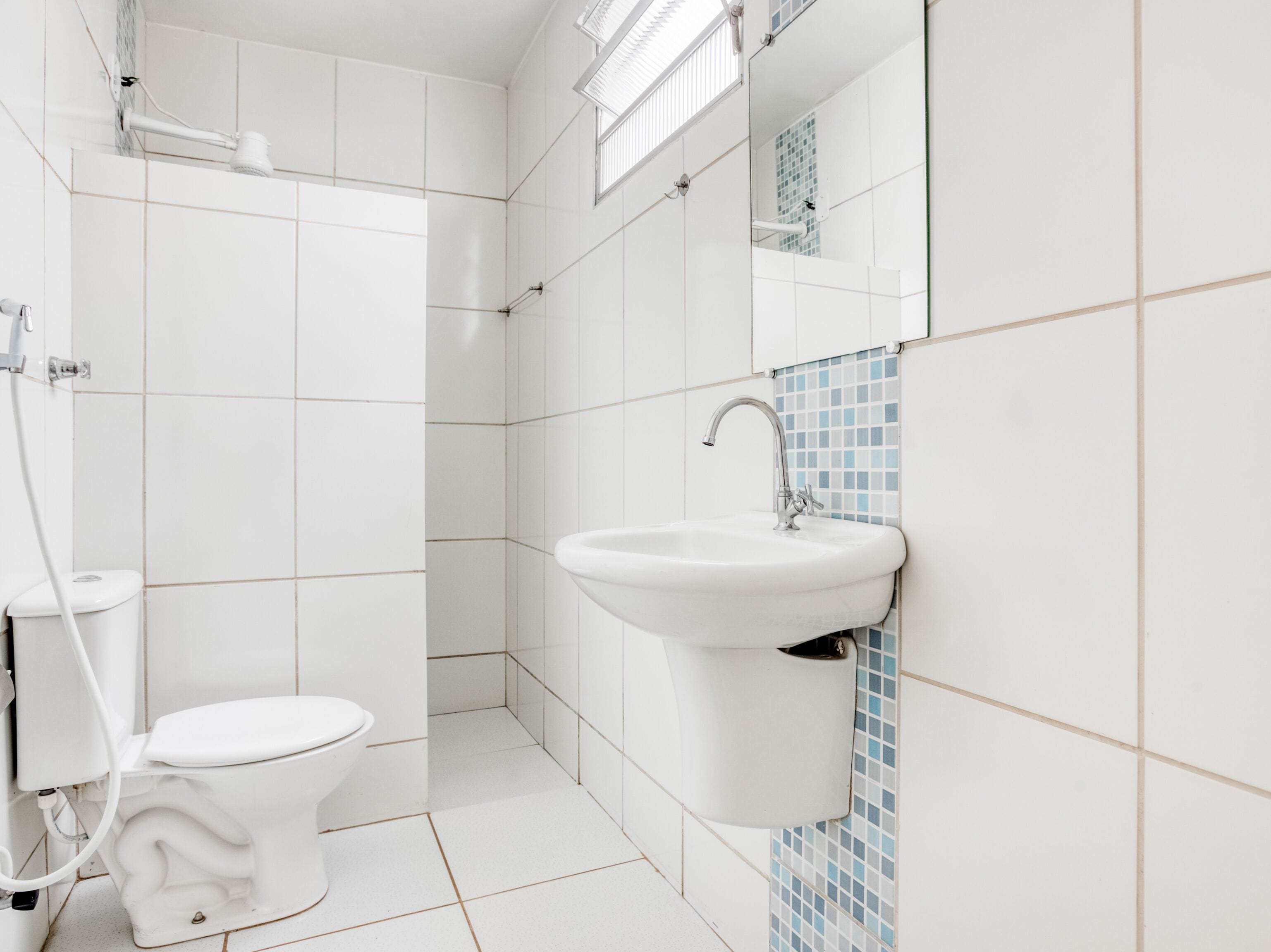 standard twin room | bathroom | shower, hair dryer, towels, soap