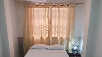 Apartment, 2 Bedrooms | 2 bedrooms, individually furnished, blackout drapes, iron/ironing board