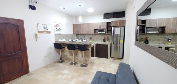 Apartment, 2 Bedrooms | Living area | Flat-screen TV