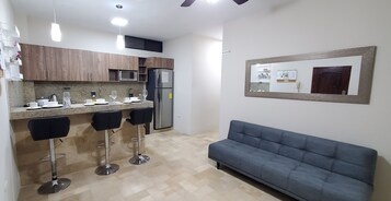 Apartment, 2 Bedrooms | Living area | Flat-screen TV