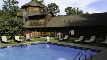 Seasonal outdoor pool, open 10:00 AM to 6:00 PM, pool umbrellas