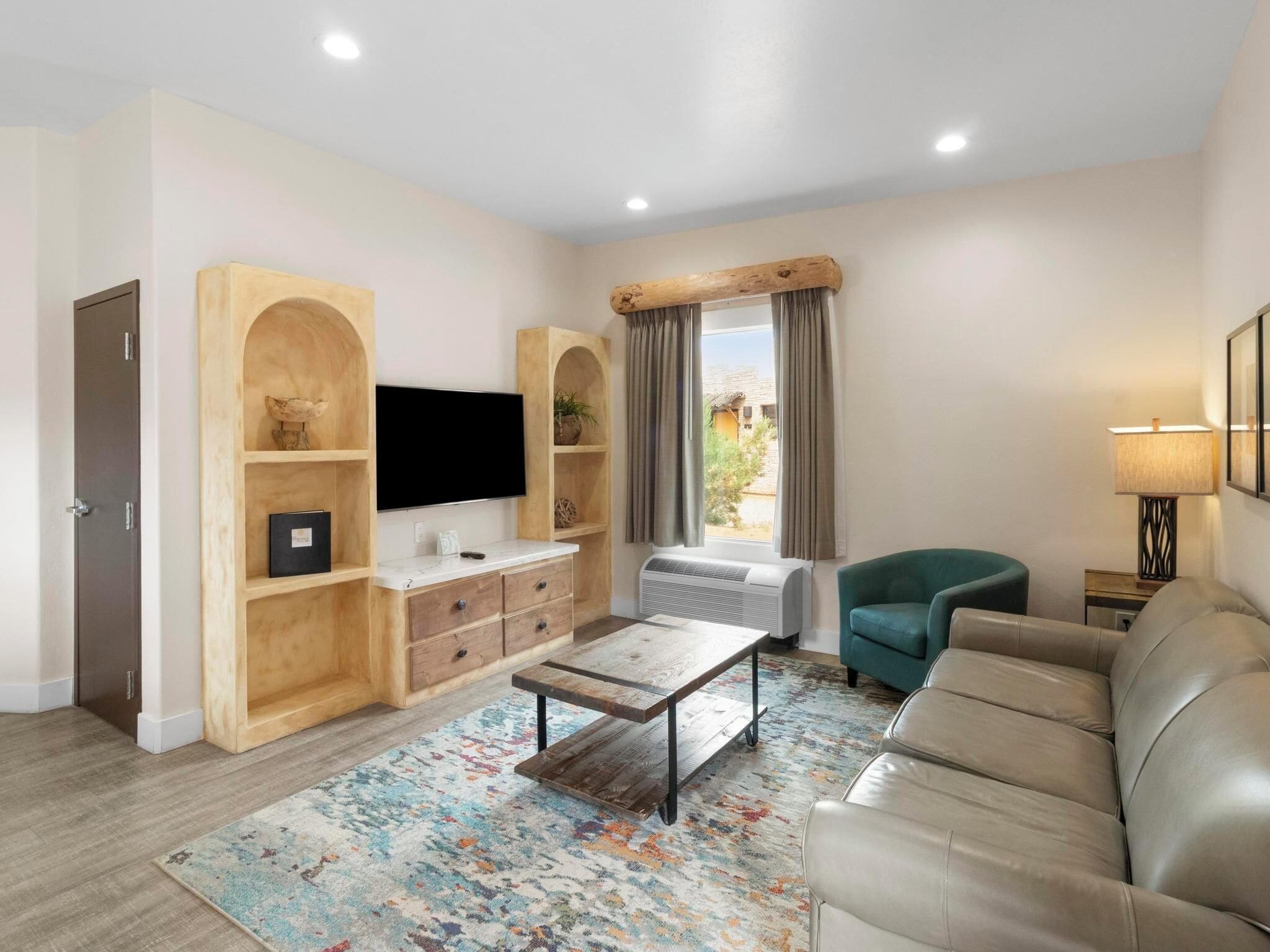 luxury suite, 1 king bed with sofa bed | living area | flat-screen tv