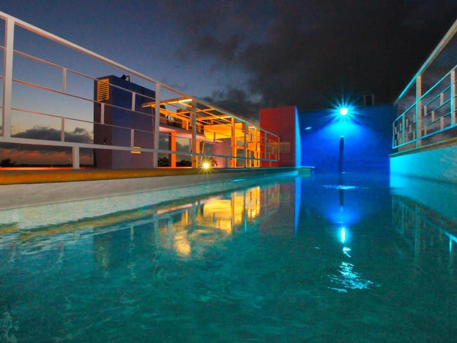 Outdoor pool, open 9:00 AM to 10:00 PM, pool loungers