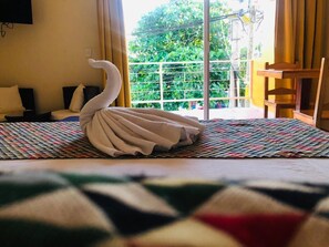 Deluxe Room, 1 King Bed, Balcony, City View | 1 bedroom, in-room safe, individually decorated, individually furnished - Hotel Arco Iris Tulum (Tulum)