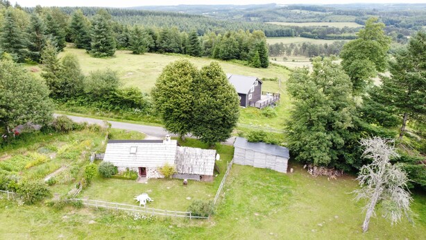 A rural property with a large tree, a small house, and a barn. - Bellchassagne: house  - 2 rooms - 2/3 persons (Bellechassagne)