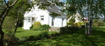 House with large terrace and fenced garden