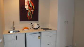 Fridge, microwave, electric kettle, toaster