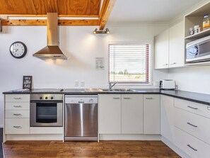 Fridge, microwave, dishwasher, cookware/dishes/utensils