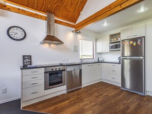 Fridge, microwave, dishwasher, cookware/dishes/utensils