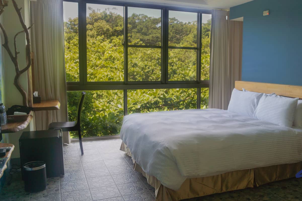 Standard Double Room | Down comforters, individually decorated, desk, blackout drapes