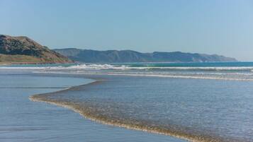Beach nearby, sun loungers