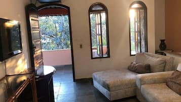 Flat-screen TV, video games, DVD player, stereo
