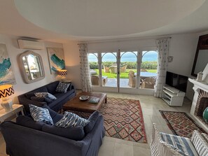 Smart TV, fireplace, DVD player, books
