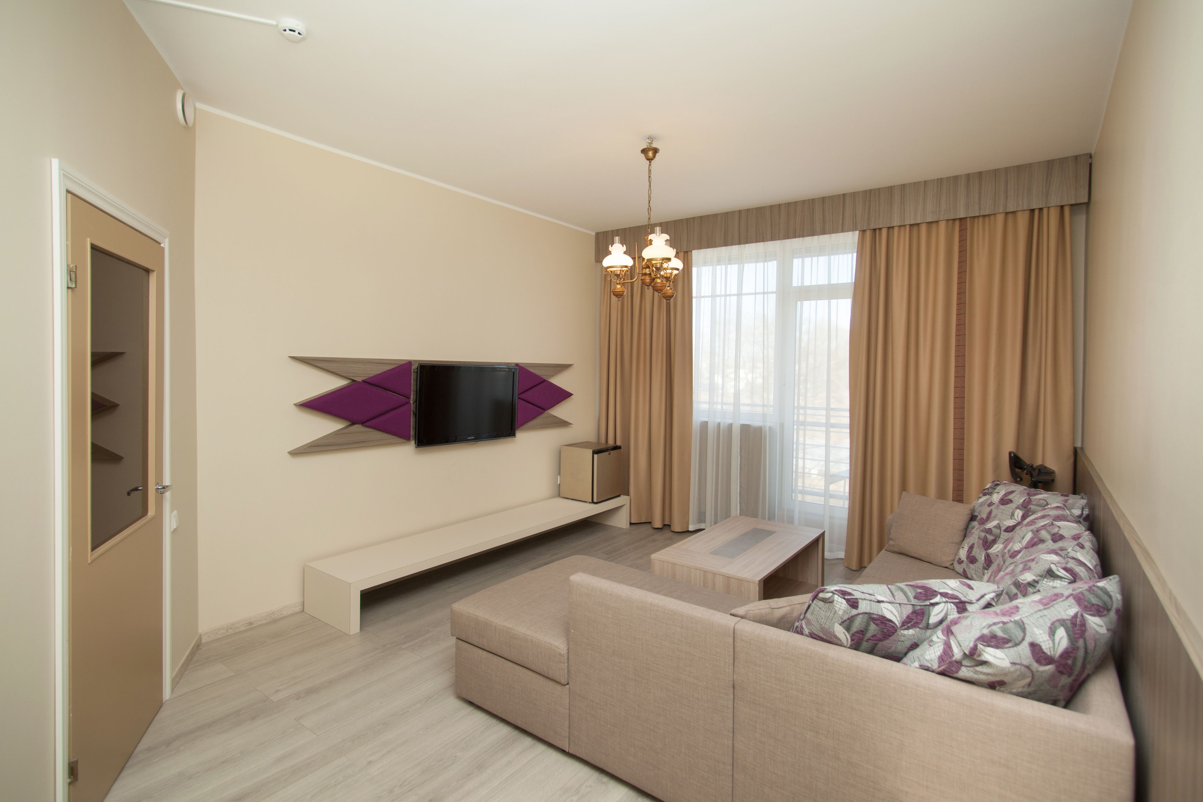 family suite, 1 bedroom | living area | tv