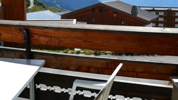 A restaurant with a view of mountains.