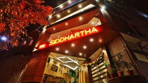A building with a sign reading "The Siddhartha." - The Siddhartha (Dharamshala)