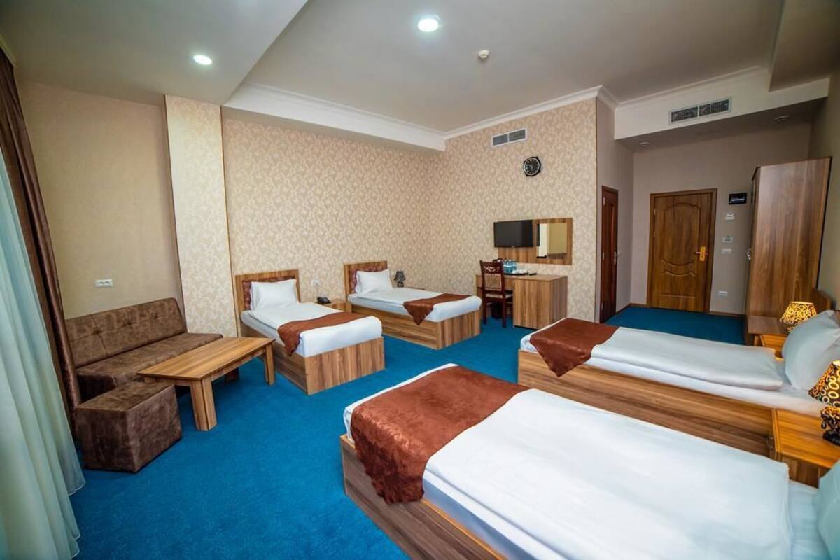 Quadruple Room | In-room safe, desk, soundproofing, rollaway beds (surcharge)