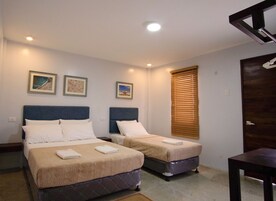 Quarto família, várias camas (Standard) | Roupa de cama