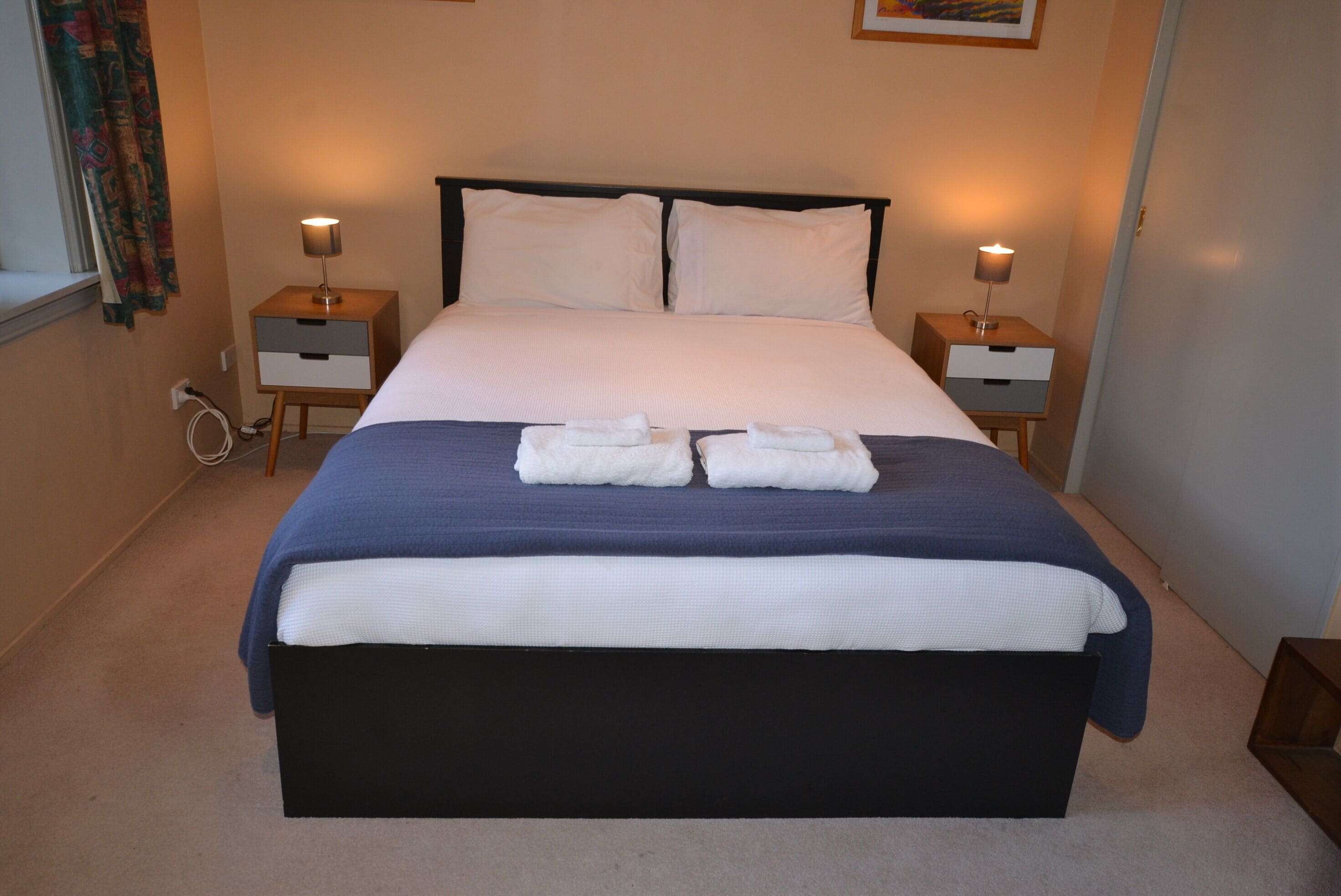 Master bedroom with queen bed and linens (provided free of charge)