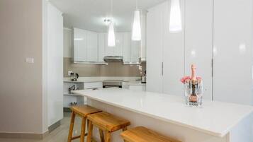 Luxury Apartment, 3 Bedrooms | Private kitchen | Full-sized fridge, microwave, oven, stovetop