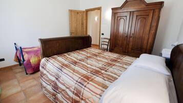 Premium bedding, blackout curtains, iron/ironing board, cots/infant beds