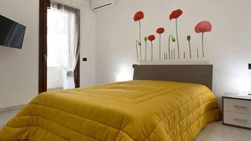 Familien-Doppelzimmer (Papaveri) | Daunenbettdecken, Bügeleisen/Bügelbrett, kostenloses WLAN, Bettwäsche