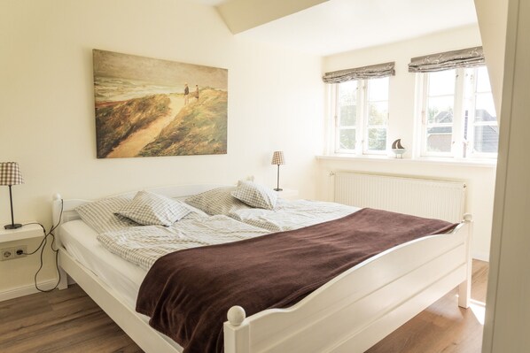 2 dormitorios, tabla de planchar con plancha, wifi gratis y ropa de cama