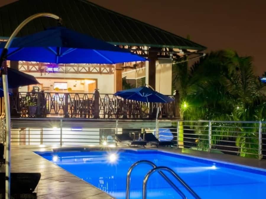 Outdoor pool, open 6:00 AM to 10:00 PM, pool umbrellas, pool loungers