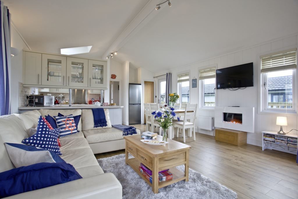 Luxury Lodge (Sea The Stars) | Living room | Flat-screen TV