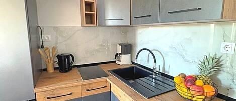 Apartment (A1) | Private kitchen | Fridge, microwave, stovetop, coffee/tea maker