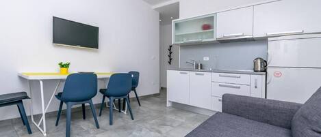 Appartement (A2) | Salle de séjour | Téléviseur