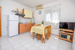 Apartment (A1) | Private kitchen | Fridge, microwave, stovetop, espresso maker