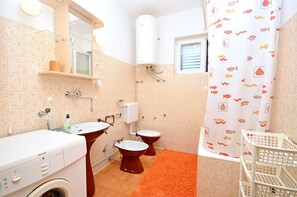 Bathroom | Shower, hair dryer - Apartment Jerka (Vodice)