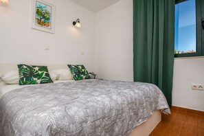 Apartment (A2) | Iron/ironing board, free WiFi, bed sheets - Apartments Sanja (Okrug)