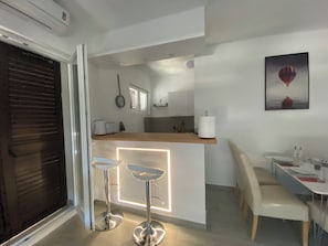 Apartment (A1) | Private kitchen | Fridge, microwave, oven, stovetop