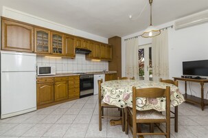 Cozinha privada | Geladeira, micro-ondas, cooktop, máquina de café expresso