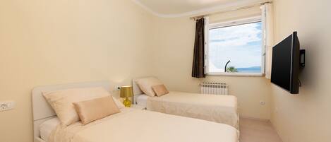 Maison | 2 chambres, coffre-fort, fer et planche Ă repasser