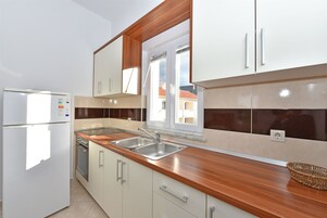 Apartment (A2) | Private kitchen | Fridge, oven, stovetop, espresso maker