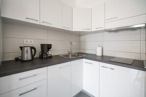 Apartment (A1) | Private kitchen | Fridge, oven, stovetop, espresso maker - Apartments Blata (Vodice)